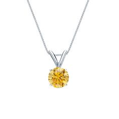 This radiant solitaire pendant features a 0.50 ct. total weight round-cut yellow diamond in 18k white gold 4-prong basket setting. The pendant comes with a matching 18-inch box chain that secures with a spring-ring clasp. Yellow Diamond Necklace, Black Diamond Pendant, Black Diamond Necklace, Black Diamond Studs, Yellow Diamond Engagement Ring, Halo Diamond Earrings, Diamond Solitaire Pendant, Solitaire Diamond Pendant, Colored Diamond Rings