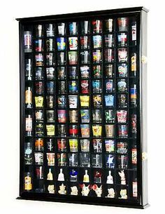 a display case filled with lots of different types of beer