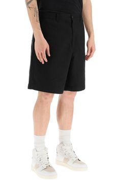 Cotton-blend bermuda shorts by7 Acne Studios featuring a concealed zippered closure with button, elasticated back of the waist, and two slash pockets. Regular fit. The model is 187 cm tall and wears size 48. Size Info IT Color Detail Black Made In Romania Material 60% CO 40% PL Season One spring Season Two summer Product clothing Brand Acne Studios Size And Fit Summer Cotton Cargo Shorts For Workwear, Spring Workwear Cotton Cargo Shorts, Modern Spring Shorts With Short Legs, Modern Short Leg Shorts For Spring, Spring Modern Short Leg Shorts, Relaxed Fit Cotton Cargo Shorts For Work, Knee-length Cotton Cargo Shorts For Spring, Spring Knee-length Cargo Shorts, Classic Cotton Shorts With Side Pockets