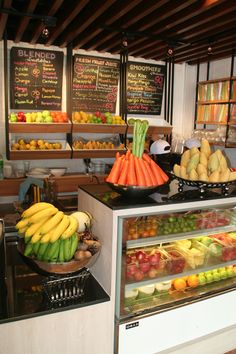 there are many different fruits on display in the store