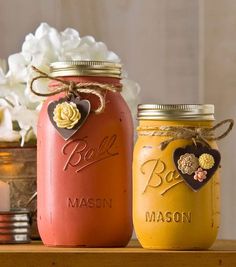 two mason jars are sitting on a table