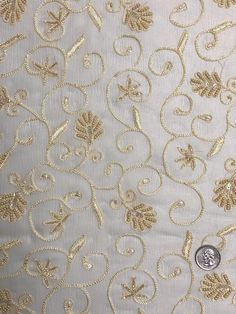 Distinguished by its luxurious design, this high-quality Cream Sequin & Beads On Silk Chiffon JEC-126-1 Fabric is perfect for women's high-end evening dresses, costumes, jackets, and skirts. Our unique and distinctive fabric is available in a wide selection of colors. The fabric is sold by the Yard, and measures 44 inches in width. Elegant Festive Pearl Embroidered Fabric, Elegant Resham Embroidered Fabric For Reception, Elegant Intricate Embroidered Fabric For Festive Season, Elegant Embellished Embroidered Fabric For Festive Season, Elegant Formal Embroidered Fabric With Intricate Embroidery, Elegant Embroidered Fabric For Festive Occasions, Elegant Fitted Embroidered Fabric For Festive Occasions, Gold Embroidered Fabric For Evening, Elegant Embroidered Fabric With Pearl Embroidery For Reception