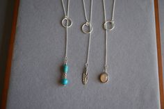 Lariat Necklace: no clasp, slip Drop Charm through the Open Circle 2 times to make sure security and make different style layering your jewelry Necklace: 1.5mm Round Rolo sterling silver chain, does not include drop, 24inch Open Circle: 15.5mm Silver Leaf Drop Size: 24mm*18mm Turquoise Drop Size: 35mm*8.3mm Sunstone Drop Size: 20mm*11.6mm Note: if you have any questions or specific requirements, please feel free to contact us We look forward to the opportunity of serving you！ Bohemian Lariat Necklace With Delicate Chain As Gift, Turquoise Lariat Necklace As A Gift, Turquoise Lariat Necklace Gift, Adjustable Bohemian Lariat Necklace With Delicate Chain, Adjustable Dangle Lariat Necklace For Layering, Bohemian Turquoise Lariat Necklace With Adjustable Chain, Turquoise Lariat Jewelry With Adjustable Chain, Bohemian Lariat Necklace With Delicate Chain Dangle, Bohemian Lariat Necklace With Delicate Dangle Chain