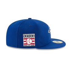 The Toronto Blue Jays Hall of Fame Weekend 59FIFTY Fitted Cap features an embroidered Blue Jays logo at the front panels with a matching MLB Batterman logo at the rear and a National Baseball Hall of Fame patch at the right-wear side. Blue Fitted Hat With Embroidered Logo For Streetwear, Blue Baseball Cap With Logo Patch And Flat Brim, Blue Baseball Cap With Logo Patch, Blue Six-panel Fitted Hat With Embroidered Logo, Blue Fitted Hat With Logo Patch And Flat Bill, Blue Flat Bill Fitted Hat With Logo Patch, Blue Flat Brim Baseball Cap With Logo Patch, Blue Baseball Cap With Logo For Sports, Blue Sports Fitted Hat With Logo Patch