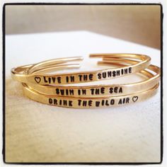 I loved hand-stamping my favorite Ralph Waldo Emerson quote onto these cuffs. “Live in the sunshine, swim the sea, drink the wild air.” Drink The Wild Air, Optimism Quotes, Live In The Sunshine, Custom Bracelet, Ralph Waldo Emerson, Personalized Bracelets, Classy And Fabulous, Custom Bracelets, The Sunshine