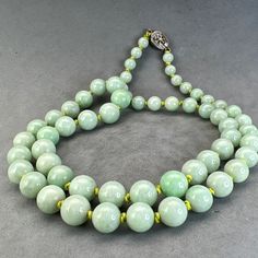 Elegant Round Jade Beaded Necklaces, Classic Jade Necklaces With Round Beads, Classic Jade Necklace With Round Beads, Classic Green Jewelry With 8mm Beads, Vintage Jade Beaded Necklace, Hand-strung Jade Round Necklaces, Hand-strung Round Jade Necklace, Hand-strung Round Jade Necklaces, Classic Jade Gemstone Beads Jewelry