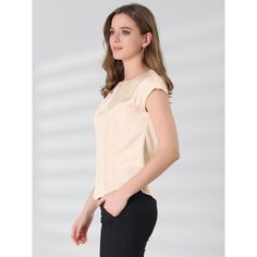 This blouse offers perfect office wear for warm weather. Cut to a fitted shape with the cap-sleeve design, just providing elegant details for the blouse. This blouse would be equally styled well with A-line skirts or skinny jeans with high heels. Designed in a fluid, flowing silky fabric that drapes beautifully around the body. Cap sleeves add some flare to your everyday look. Solid Color Sleeveless Blouse For Work, Sleeveless Blouse For Work, Beige Office Lady Tops, Office Crew Neck Blouse, Plain Summer Office Tops, Elegant Plain Shirt For Work, Casual Beige Blouse For Office, Summer Workwear Plain Blouse, Solid Crew Neck Blouse For Work