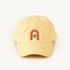 A buttery yellow dad cap with cactus + arch stitching (front) and SideDish stitching (back). Dad jokes not included. Yellow Cotton Baseball Cap With Curved Bill, Yellow Cotton Dad Hat, Yellow Cotton Dad Hat With Curved Brim, Yellow Cotton Curved Brim Dad Hat, Yellow Cotton Dad Hat, One Size Fits Most, Casual Yellow Hat With Curved Visor, Yellow Cotton Dad Hat For Spring, Yellow Snapback Dad Hat For Spring, Trendy Yellow Snapback Dad Hat