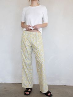 Fun floral printed lounge pants with pockets. Sizing: Model is 5'8", wearing a size S - Content: 100% Cotton Care: Handwash recommended Imported Cotton Wide Leg Sleep Bottoms, Spring Loungewear Sleepwear With Pockets, Wide Leg Cotton Sleep Bottoms, Spring Sleepwear With Pockets For Loungewear, Wide Leg Sleep Pants With Pockets, Relaxed Wide Leg Sleepwear With Elastic Waistband, Relaxed Fit Pants With Pockets For Pajama Party, Comfortable Relaxed Fit Pajama Pants, Trousers Sleepwear With Pockets For Loungewear