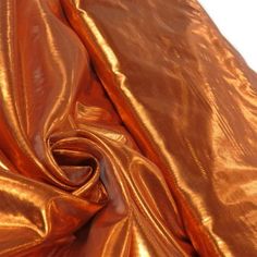 a close up view of an orange fabric