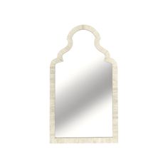 a white mirror with an arch shaped design on the top and bottom, against a white background