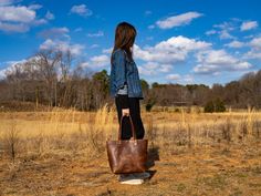 Classic Chestnut Leather Tote Bag Leather Tote bag is a must-have in every woman's wardrobe. It gets with anything and works for any occasion. Traveling, academics, shopping, dating, work or parties - tote bag has you covered. Our leather tote is very roomy and can keep all your essentials no matter where you go. Despite its spaciousness, the tote bag looks elegant and sleek. It is made of natural leather and features convenient design with pockets inside, key carabiner and a magnetic snap closu Fall Leather Lined Tote Shoulder Bag, Fall Leather-lined Shoulder Bag, Medium Satchel With Top Carry Handle, Casual Satchel With Leather Lining, Fall Shoulder Bag With Leather Lining, Leather-lined Tote Bag For Fall, Fall Tote Bag With Leather Lining, Casual Shopping Bags With Leather Lining, Casual Bags With Leather Lining For Shopping