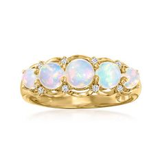 Ross-Simons - Ethiopian Opal Ring with Diamond Accents in 14kt Yellow Gold. Size 8. Indulge in the luminous glow of opal, celebrated here with five 3.5-5mm round opal cabochons that flicker a dazzling play of color from a warm 14kt yellow gold setting. Diamond accents only add to the brilliant design. 1/4" wide. Ethiopian opal ring.  Opal birthstones are the perfect gift for October birthdays. Opal Birthstone Ring, October Birthdays, Ethiopian Opal Earrings, Vintage Opal Engagement Ring, Opal Birthstone, Black Onyx Earrings, Ethiopian Opal Ring, Yellow Opal, Ring Opal