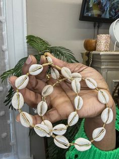 Handmade cowrie hoop earrings made with brass , do you like them big? Well here it is, super fun and not heavy Handmade Small Hoop Earrings For Vacation, Handmade Hoop Jewelry For The Beach, Trendy Gold Hoop Earrings For Beach, Handmade Small Hoop Jewelry For Vacation, Unique Adjustable Hoop Earrings For The Beach, Handmade Hoop Jewelry For Vacation, Trendy Gold Hoop Earrings For Vacation, Handmade Gold Hoop Earrings For Vacation, Metal Hoop Earrings For Summer Beach