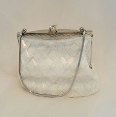 "Here's the brides \"something old\" that still looks brand new!  Its the perfect vintage bridal bag.  Delicate white beading with gold chain and accents and a creamy ivory lining.  5.5\"x4\" bag, base is 6\"x2.5\"" Formal White Bags With Pearl Handle, Formal White Bags With Pearl Details, Classic Clutch Evening Bag For Wedding, Classic White Bridal Accessories For Formal Occasion, Classic Clutch Bags For Wedding, Vintage White Bags With Pearl Handle, Classic Wedding Clutch Bag, Vintage White Bag With Pearl Handle, Silver Evening Bag With Pearl Handle For Wedding