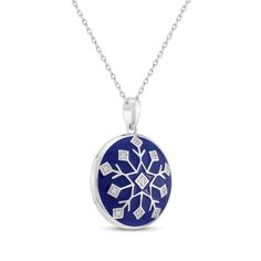 Create your own winter wonderland with this glistening snowflake necklace. Sterling silver White lab-created sapphires shimmer on the dark blue enamel disc pendant 18-inch cable chain with lobster clasp Blue Snowflake Sterling Silver Necklace, Round Winter Jewelry Gift, Round Jewelry Gift For Winter, Blue Cable Chain Jewelry As A Gift, Blue Sterling Silver Cable Chain Jewelry, Blue Necklace For Christmas Gift, Blue Round Cable Chain Necklace, Snowflake Necklace, White Lab