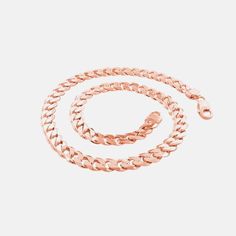 Our "Curb Couture" rose gold curb chain necklace is the ultimate fashion necessity. Made of .925 sterling silver and dipped in stunning rose gold. A unisex necklace. Lobster claw clasp for a secure fit. Rose gold curb links are lightweight for comfortable wear. Great for layering with multiple rose gold chain necklaces. Also looks beautiful as a single statement piece. Italy. Measurements: 10mm wide x .31 inch width; 24 inch total length Material 925 Sterling Silver, Rose Goldtone Finish Rose Gold Figaro Chain Necklace, Rose Gold Cuban Link Necklace With Curb Chain, Rose Gold Cuban Link Chain Necklace, Rose Gold Cuban Link Chain Necklaces, Rose Gold Cuban Link Chain Necklace Gift, Rose Gold Link Chain Necklace Tarnish Resistant, Rose Gold Chain Link Necklace With Lobster Clasp, Gold Chain Necklaces, Rose Gold Chain Necklace