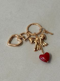 Gold-toned keyring with three removable charms  Princess Polly Lower Impact  45% reclaimed zinc alloy 45% reclaimed steel 10% glass Baby Crop Top, Birthday Wishlist, Online Fashion Boutique, Gold Branding, Birthday Shopping, Car Set, Girly Jewelry, Summer Accessories, Floral Dress Black