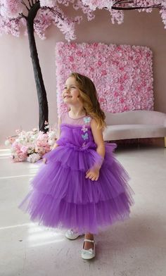 "* PREORDER AND CUSTOM ORDER ONLY* * Pleated tulle bodice multi~tiered layered tulle knee/calf length skirt, handmade butterfly, cotton lining for comfort. conceal zipper at the back.  *Steam to make it fluff *Can be custom made up to size 10 years  Can be customized in many colours  and size Mother-daughter dress can be made on order 4 to 6 days production time for preorder and custom orders Need it sooner? Contact me for details on rush orders.  IF YOU WANT YOUR DELIVERY FASTER THEN CONTACT ME Purple Ball Gown Dresses With Ruffles, Purple Ruffled Ball Gown Dress, Tulle Dress With Ruffles For Dress-up, Whimsical Tulle Fairy Dress With Ruffles, Whimsical Ruffled Pageant Dresses, Whimsical Ruffled Dresses For Pageants, Purple Princess Ball Gown Dress, Princess Style Fairy Dress With Ruffles, Princess Style Tulle Fairy Dress With Ruffles