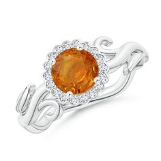 Resembling the luscious hue of a tangerine, the round orange sapphire looks breathtaking on this ring. Round diamonds in a scintillating floral halo surround it and highlight its eye-catching allure. Beautiful leaf motifs adorn the twisted vine shank and augment the overall look of this 14k white gold vintage style ring. Vintage Sapphire Ring, Vine Ring, Floral Halo, Vintage Style Rings, Orange Sapphire, Sapphire Ring, Round Diamonds, Heart Ring, Vines