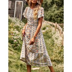 Apricot Bohemia Print Pleated Woven Casual Dress Beige Bohemian Floral Dress For Spring, Casual Flowy Apricot Dress, Beige Floral Print Boho Dress For Vacation, Beige Boho Dress With Floral Print For Vacation, Casual Beige Boho Print Maxi Dress, Casual Beige Boho Dress With Boho Print, Beige Bohemian Dress With Ditsy Floral Print, Casual Cream Maxi Dress With Floral Print, Casual Apricot Midi Dress For Spring