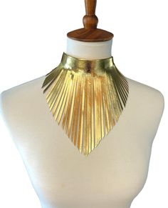 "Using the finest quality Italian leather, this is such a beautiful statement piece! Each tassel has been cut and shaped to make this \"wow\" factor accessory. Guaranteed, this will jazz up any outfit you wear, both for a casual and a more formal look. The necklace measures 7 inches at its longest point and is adjustable." Adjustable Fringe Choker, Adjustable Gold Fringe Necklaces, Adjustable Gold Necklace With Fringe, Gold Fringe Necklace For Party, Chic Adjustable Fringe Jewelry, Fringe Choker Necklace For Party, Leather Fringe Necklace, Gold Fringe Necklace, Necklace Leather