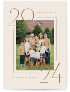 a family photo with the numbers twenty and four on it is shown in gold foil