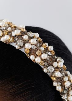 One of our most beautiful headpieces to date, the Ayden Headband leaves onlookers utterly enchanted. A beautiful entanglement of crystals and pearls are embroidered by hand, with a strand of smaller crystals entwined between stones, resulting in a finished look that's sparkling from every angle— a truly noteworthy finishing touch. This headband is crafted by hand in our New York studio on a pure silk headband, with volume that magnifies the incredible details. Beautiful Headpieces, Headband Crystal, Luxury Hair Accessories, Leaves Headband, New York Studio, Silk Headband, Jennifer Behr, Crystal Headband, Luxury Hair