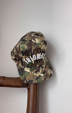 Our new camo Reverse Cowgirl hat features a white thick puff embroidery to really make it stand out. With an adjustable strap in the back it is one size fits all. This is the perfect touch for your next country concert outfit. All hats are final sale. Hip Hop Style Outdoor Hat, Camouflage Baseball Cap For Streetwear, Adjustable Camouflage Hat For Summer, Summer Military Cap Style Hat, Military Style Baseball Cap For Summer, Military Style Visor Hat For Summer, Military Style Summer Visor Hat, Casual Camouflage Bucket Hat, Military Style Summer Hat, One Size Fits Most