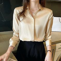 This Is A Beautiful Satin Finished Champagne Colored Blouse Very Classy And Elegant! 97%Polyester 3%Spandex! Size Med.This Blouse Is Flawless Not A Mark Or Snag! Button Down Closure Long Sleeve With Button Closure. Blouse Is Sure To Be A Head-Turner!! Measurements: Underarm To Underarm: 20” Front: 27” Back: 29” Sleeve: 23” Formal Tops For Women, Office Shirts, Women Blouses Fashion, Womens Trendy Tops, Stylish Blouse, Satin Shirt, Turndown Collar, Satin Blouse, Vintage Button