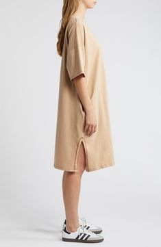 Lean into the effortless comfort of this oversized, stretchy cotton T-shirt dress featuring side slits for even more ease. Crewneck Elbow-length sleeves Side-seam pockets Side slits 95% cotton, 5% spandex Hand wash, line dry Made in the USA of imported fabric Casual Dresses With Side Slits And Split Hem, Oversized Cotton Dress For Loungewear, Cotton T-shirt Dress For Everyday, Oversized T-shirt Dress With Short Sleeves For Daywear, Relaxed Fit Crew Neck Everyday Dress, Casual Oversized T-shirt Dress For Daywear, Oversized Casual T-shirt Dress For Daywear, Casual Oversized Longline Dress, Cotton T-shirt Dress With Crew Neck For Daywear