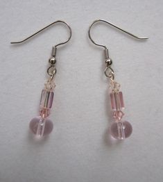 You will see various shades of pink in these pretty drop earrings Perfect for your Quinceanera Like pink? You might like this necklace/earrings set... https://www.etsy.com/listing/250668959 To return to my shop, click the link below: http://www.etsy.com/shop/BareBearDesigns Quinceanera Pink, Pink Crystal Earrings, Shades Of Pink, Pink Earrings, Fun Earrings, Diy Accessories, Pink Crystal, Necklace Earring Set, Unique Earrings