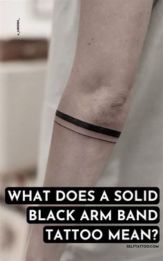 a man with a tattoo on his arm that says, what does a solid black arm band tattoo mean?