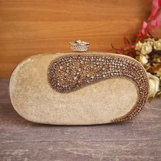 *Pre-order only (4 weeks processing time from placing an order)* A soft blend of regal luxury, this gorgeous velvet clutch is embellished with sequins and stones and is perfectly sized to carry your essentials. Whether it is a wedding, party or social event, grab this stunning clutch to accessorise your outfit. With one main compartment and a magnetic fastening, this clutch is completed with a chain strap which can be worn as a shoulder bag or tucked in for a clutch style. Dimensions: 20cm x 12cm x 5cm Chic Velvet Evening Bag, Glamorous Embellished Evening Bag For Events, Elegant Hand Embellished Evening Bag For Events, Chic Hand Embellished Party Bags, Glamorous Hand Embellished Evening Bag For Events, Glamorous Hand-embellished Evening Bag For Events, Elegant Hand Embellished Party Bags, Chic Hand Embellished Rectangular Evening Bag, Hand Embellished Rectangular Evening Bag For Party