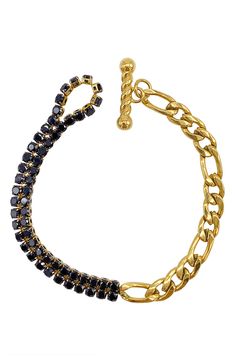 Contrasting black crystals add an edgy appearance to this water-resistant figaro chain bracelet. 7.5" length; 6mm width Toggle closure This piece of jewelry is water-resistant and will not tarnish with water contact 14k yellow gold plated stainless steel/glass crystal Imported Adjustable Black Chain Link Jewelry, Black Chain Link Jewelry With Lobster Clasp, Trendy Black Chain Link Bracelet, Trendy Black Link Jewelry, Adjustable Chain Crystal Bracelet For Party, Black Link Bracelets With Adjustable Chain, Adjustable Black Link Chain Bracelet, Black Chain Link Edgy Jewelry, Trendy Black Metal Chain Bracelet