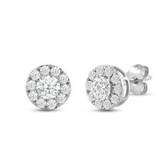 pair of white gold diamond earrings with round halos and pave set diamonds in the center