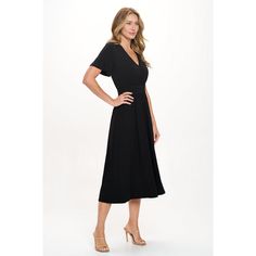 Our Candace dress has a v-neckline, flutter sleeves, a faux wrap detail and a straight hem. The easy fit silhouette and comfort stretch will make this dress a favorite piece you'll want in every print and color. Made in USA. Machine washable Flowy V-neck Dress With Surplice Neckline For Date Night, Flattering V-neck Wrap Dress For Summer, Flowy V-neck Midi Dress For Work, Chic Black V-neck Dress With Surplice Neckline, Flowy Midi Dress With Surplice Neckline, Black V-neck Dress With Surplice Neckline For Spring, Flowy V-neck Faux Wrap Dress, Flowy Faux Wrap V-neck Dress, Fitted V-neck Faux Wrap Maxi Dress