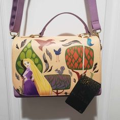 --Brand New W/ Tags --Such A Cute Bag For Any Disney Fan --Very Spacious --Paint Style Art On The Front --Pascal Interior Print --Strap Is Adjustable Themed Purple Travel Bags, Themed Multicolor Rectangular Bag, Disney Style Rectangular Shoulder Bag For School, Disney Multicolor Rectangular Bag, Disney Style Gift Bag, Rectangular Shape, Disney Rectangular Shoulder Bag For Everyday Use, Disney Rectangular Shoulder Bag For Daily Use, Trendy Rectangular Bags For Disney Trips, Nightmare Before Christmas Wreath