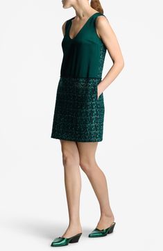 A solid twill front offers textural contrast to the metallic-tweed of this jewel-toned sleeveless dress cut in a leggy length. Hidden back-zip closure V-neck Sleeveless Side-seam pockets 40% polyester, 24% cotton, 22% wool, 5% acrylic, 5% polyamide, 3% viscose, 1% metallic fibers Dry clean Made in the USA Designer Clothing Embellished Tweed Evening Dress, Sleeveless Tweed Evening Dress, Elegant Sleeveless Tweed Cocktail Dress, Green Tweed Dress For Work, Sleeveless Tweed Dress For Formal Occasions, Formal Sleeveless Tweed Dress, Sleeveless Tweed Formal Dress, Dress Cuts, Jewel Tones