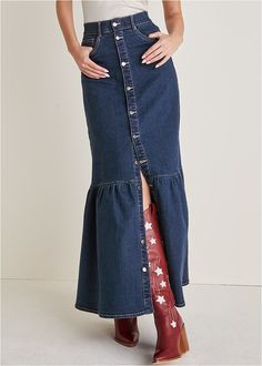 A free-spirited western vibe is yours with this long denim skirt. The flared shape and twirly tiered hem give this playful piece a flirty feel. Leave a few buttons undone at the bottom to reveal a pop of leg and show off your bold boots underneath. Paired with a tee or tank, cozy sweater and more, you'll find yourself reaching for this versatile skirt just as often as your favorite pair of jeans.  * Available in plus sizes  * Runs small; size up for a better fit  * Button front  * Pockets  * Maxi length, 41"  * Fabric has stretch  * Cotton/polyester/elastane. Imported Denim Skirt Outfit Boots, Long Denim Skirt Outfits, Skirt Inspiration, Long Denim Skirt, Denim Skirt Outfits, Denim Button Down, Work Wear Women, Online Fashion Stores, Swim Dress