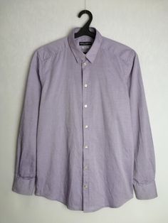 DOLCE & GABBANA vintage men's button up shirt, made in Italy Fair condition, has some imperfections (shown in the last photo). Please refer to photos for details of condition. Size tagged 15 ¾ - 40, fits like S (please check measurements) Composition: 100% cotton Measurements: Shoulder to shoulder - 17.3" / 44 cm Pit to pit - 20.9" / 53 cm Back length from collar - 31.1" / 79 cm Sleeve length from shoulder - 26.4″ / 67 cm * All measurements are taken with the garment laying flat #5379 Cotton Business Shirt With Collar, Casual Collar Cotton Office Shirt, Cotton Office Shirt, Cotton Business Shirt Button-up, Business Cotton Button-up Shirt, Business Casual Shirt With Collar And Buttons, Purple Cotton Dress Shirt For Work, Purple Cotton Business Shirt, Business Casual Purple Cotton Shirt