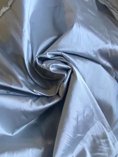 The Italians can do faux silk flawlessly! This made in Italy faux silk taffeta in silver with black iridescence is stunning! Feels and drapes exactly like a light silk taffeta. Can be used for historical costuming, interior decorating, or drapery, and skirt garments. Will combine shipping. 55” Wide. Sold by the continuous yard. Photo on the right is for inspirational purposes only. It is not made of the actual fabric but of similar fabric. The photos of the fabric is the actual fabric being sold Historical Costuming, Light Silk, Taffeta Fabric, Silk Taffeta, Dress Inspo, Material Girl, Brocade Fabric, Silk Material, Women Helping Women