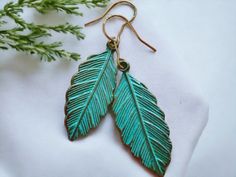 Nature inspired mixed metal leaf earrings give an earthy boho vibe. Eye-catching, light weight, and elegant, perfect for everyday wear or special occasions. Nickle free, on platted 14K earwire. Makes a great gift for a nature loving best friend or loved one. Everything in this shop is handmade by me. I try my best to accurately photograph the details of each piece. Utilizing indoor and outdoor lighting to give you the best visuals possible. If you have any questions about the size, color, texture or anything else, please feel free to message me.  To extend the life of your jewelry, please avoid exposure to liquids. This includes: water, perfume, lotion, sunscreen, soap, chemicals, etc. Do not wear jewelry to bed. And always keep each piece separately in a jewelry box or zip lock bag, away Bohemian Leaf-shaped Jewelry With Ear Wire, Bohemian Nickel-free Leaf-shaped Earrings, Lover Earrings, Metal Leaves, Boho Vibe, Leaf Earrings, Jewelry Gift Box, Nature Inspired, Nature Lover