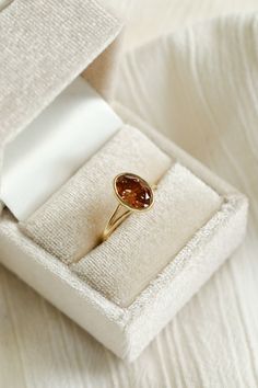 Cognac Oval Fleur – June Rings Elegant Amber Oval Rings, Elegant Amber Oval Jewelry, Oval Amber Cabochon Ring, Amber Oval Cabochon Rings, Elegant Carnelian Oval Cabochon Ring, Amber Highlights, June Rings, Amber Ring, Split Shank