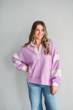 Introduce effortless sophistication with our Lavender Burst Top. Crafted from soft terry knit, this loose-fitted top features a v-neck, color block design, and side slits for a modern touch. Elevate your wardrobe with this versatile and stylish piece. Material: 100% CottonCare:Hand wash cold, do not bleach, hang or line dry. Available in both the Fort Wayne and North Manchester boutique locationsDon't forget! We're more than just a clothing boutique- we are a top-rated full-service florist opera Trendy Contrast Color Tops For Loungewear, White Tops With Contrast Color For Loungewear, White Contrast Color Top For Loungewear, Chic Purple Tops For Loungewear, V-neck Color Block Top For Layering, Dear Ava, Itzy Ritzy, Color Block Design, The Fort