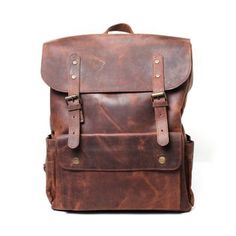 Dark brown leather backpack Brown Leather Backpack With Adjustable Strap For On-the-go, Luxury Brown Backpack For School, Luxury Brown School Backpack, Modern Brown Backpack For On-the-go, Classic Brown Leather Backpack For Travel, Classic Brown Leather Travel Backpack, Luxury Brown Backpack For Daily Use, Brown Leather Lined Backpack For Travel, Travel Brown Leather Lined Backpack