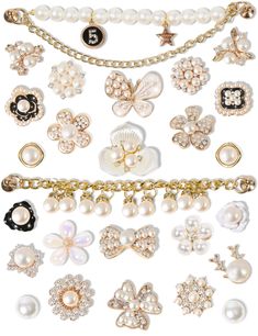 an assortment of pearls and jewels on a white background