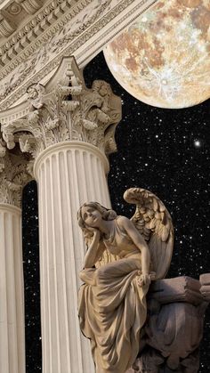 an angel statue sitting on top of a pillar next to a full moon in the sky