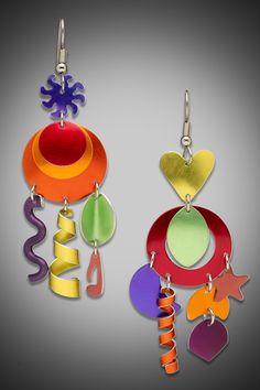 Aluminum Earrings - These delightful earrings are anodized, dyed & hand crafted by the artist to create a unique, playful pair of asymmetric earrings. In purple, raspberry, lime, orange, yellow, blue & rust, they measure 2 1/2 long & move about gently on the ear. They are made of aluminum so virtually weightless & hang from non-allergenic surgical steel ear wires. Colorful Playful Dangle Earrings, Vibrant Rainbow Dangle Earrings, Vibrant Colorful Earrings For Gifts, Colorful Playful Dangle Jewelry, Playful Colorful Dangle Jewelry, Modern Multicolor Single Earring, Multicolor Metal Ear Wire Earrings, Multicolor Metal Earrings With Ear Wire, Colorful Vibrant Earrings With Ear Wire