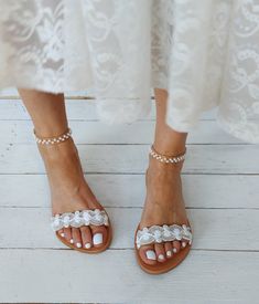 SHIPPING via DHL EXPRESS WORLDWIDE: 1 - 4 business days delivery (Please fill in your phone number if you choose Express Shipping) ★ More wedding sandals and shoes: See my store: https://www.etsy.com/shop/PelinoSandals 💓 Handmade genuine Greek leather wedding sandals decorated with romantic lace or crystals,pearls,rhinestones ( all the embellishments are hand sewn onto the leather straps) for brides dreaming of a beach wedding, a Bachelor party or even a city wedding. I am here to create with y Spring Wedding Lace-up Ankle Strap Sandals, Flat Summer Wedding Shoes For Bridesmaids, Flat Sandals For Spring Wedding, Summer Flat Heel Bridesmaid Wedding Shoes, Summer Wedding Shoes With Flat Heel For Bridesmaids, Summer Bridesmaid Wedding Shoes With Flat Heel, White Flat Bridesmaid Wedding Shoes, Spring Wedding Closed Toe Sandals, Wedding Shoes With Single Toe Strap